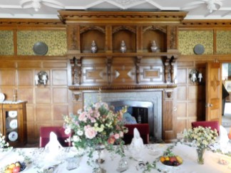 The dining room, the table laid for a royal visit.